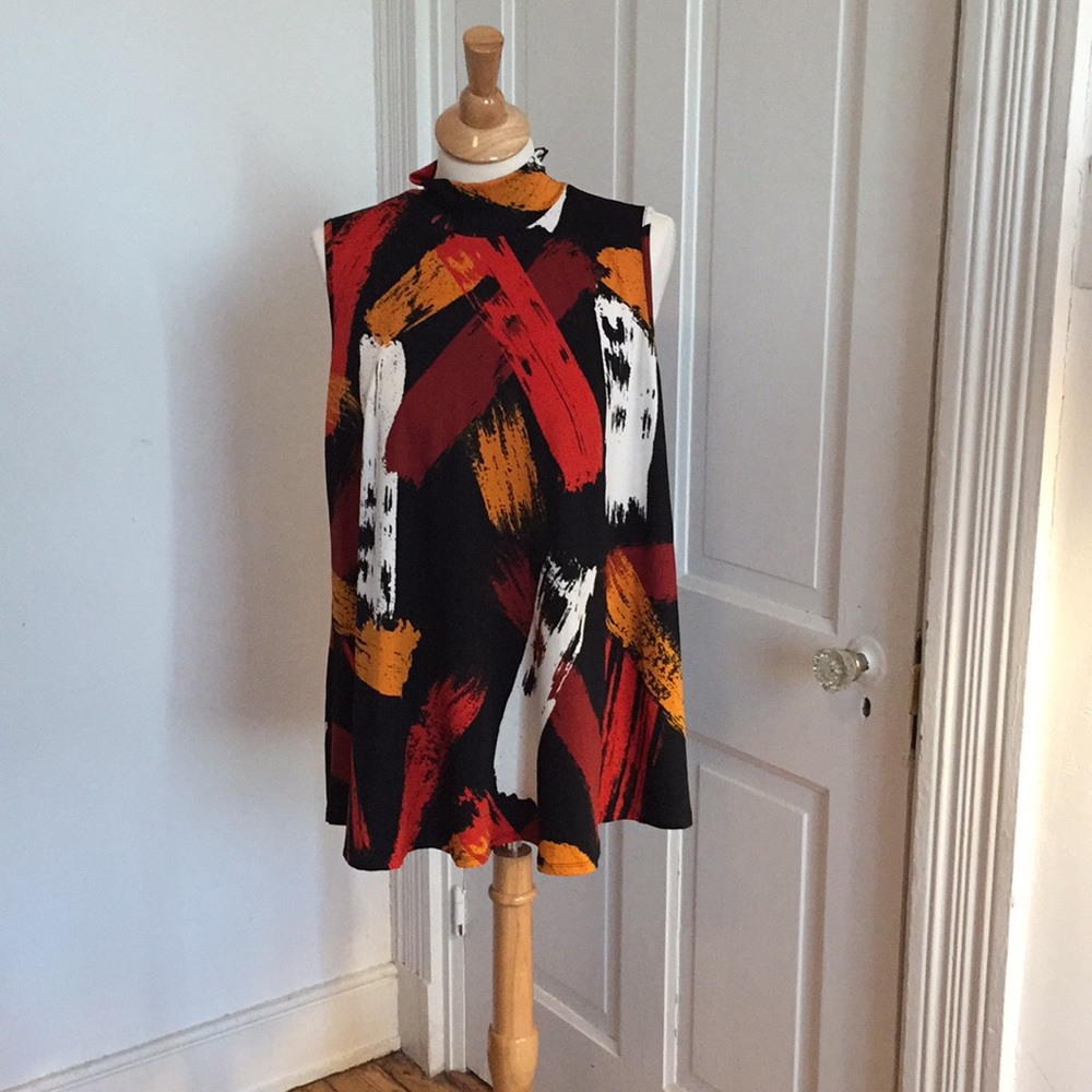 Women’s sleeveless patterned turtleneck L